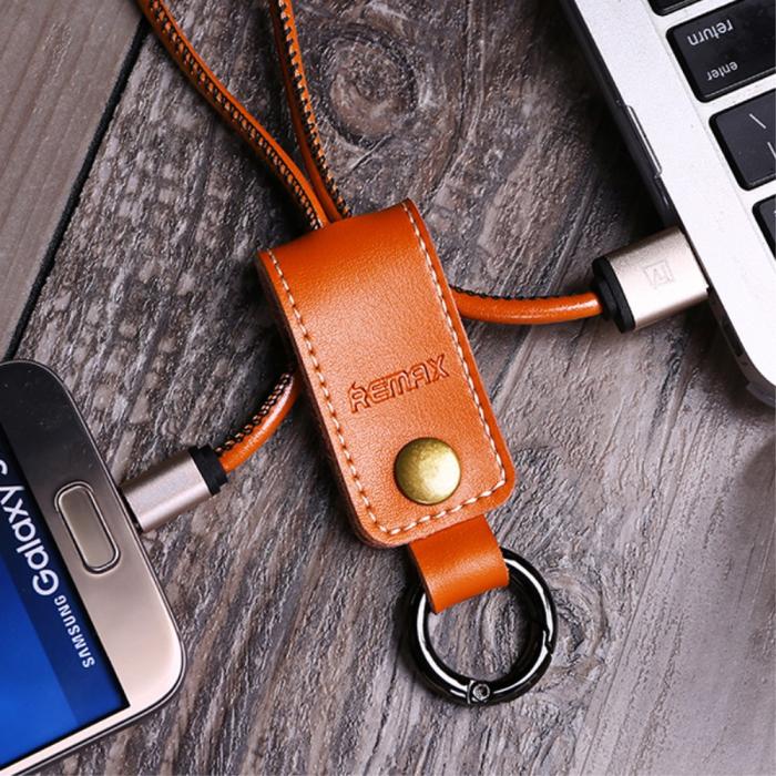 UTGATT5 - REMAX Retractable Ladd och Synkkabel Micro USB - Brun