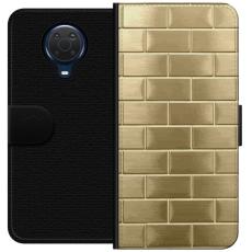 iSecrets - Pl&aring;nboksfodral till Nokia G20 med Gyllene Murstenar