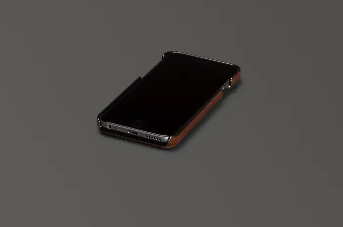 UTGATT5 - Sena Lugano Äkta Läder Skal till Apple iPhone 6 / 6S Plus - Svart
