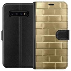 iSecrets - Pl&aring;nboksfodral till Samsung Galaxy S10 med Gyllene Murstenar