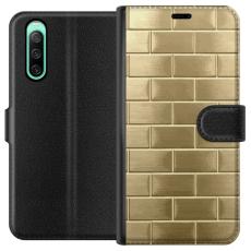 iSecrets - Pl&aring;nboksfodral till Sony Xperia 10 IV med Gyllene Murstenar