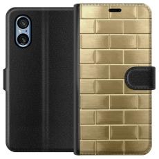 iSecrets - Pl&aring;nboksfodral till Sony Xperia 10 VI med Gyllene Murstenar