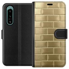 iSecrets - Pl&aring;nboksfodral till Sony Xperia 5 IV med Gyllene Murstenar