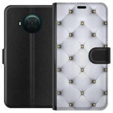 iSecrets - Plånboksfodral till Nokia X20 med Fancy