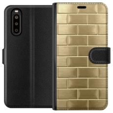 iSecrets - Pl&aring;nboksfodral till Sony Xperia 10 II med Gyllene Murstenar