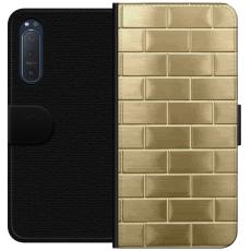 iSecrets - Pl&aring;nboksfodral till Sony Xperia 5 II med Gyllene Murstenar