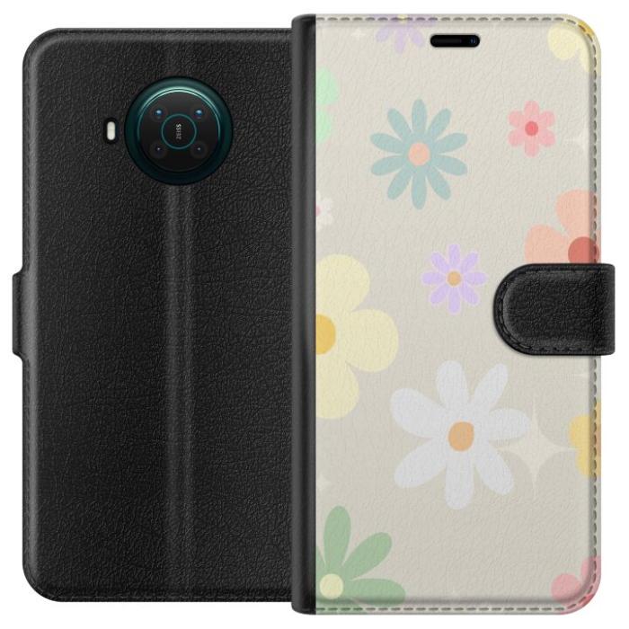 iSecrets - Plånboksfodral till Nokia X20 med fejdande blommor