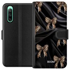 Gustaf - Pl&aring;nboksfodral till Sony Xperia 10 IV med Leopard Bow