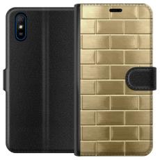 iSecrets - Plånboksfodral till Xiaomi Redmi 9A med Gyllene Murstenar