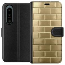 iSecrets - Pl&aring;nboksfodral till Sony Xperia 5 III med Gyllene Murstenar