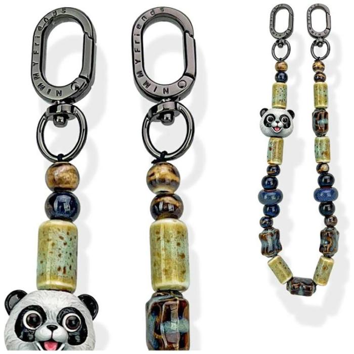 NIMMY - Nimmy Mobilrem Väska berlock Big Eye Cute Pets 2.0 - Svart
