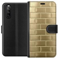 iSecrets - Pl&aring;nboksfodral till Sony Xperia 10 III med Gyllene Murstenar