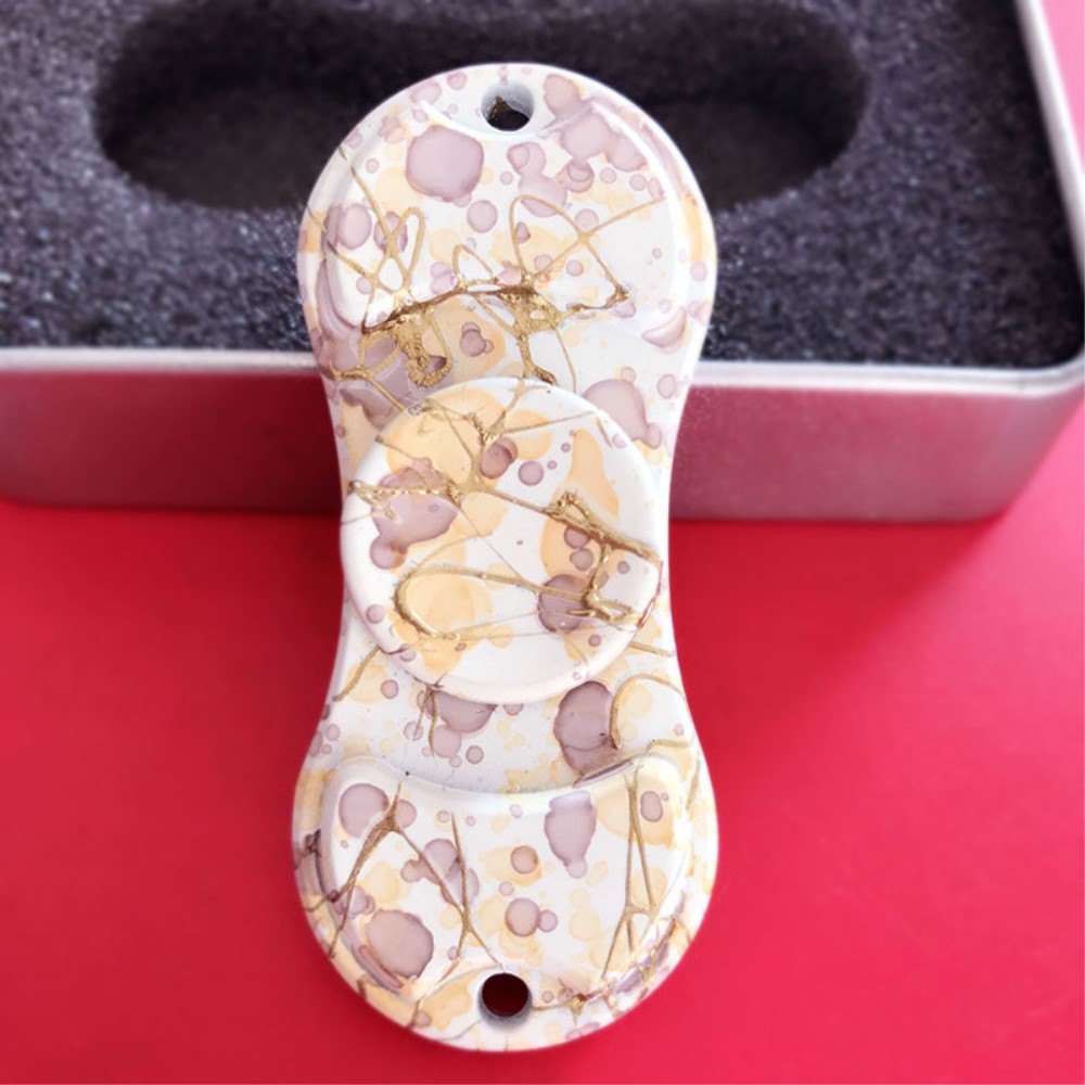 Fidget Spinner
Fidget Spinner med mönster - Vit